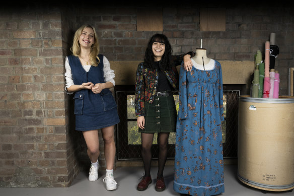 Playwright Emme Hoy and director Jessica Arthur with costumes from the production.