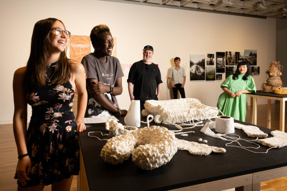Isabella Molinari (left), Sabry Beshir Mohamed (second from left), and Jim Dawes (fourth from left) have their work at ArtExpress this year, with previous exhibitors Jasper Knight and Louise Zhang.