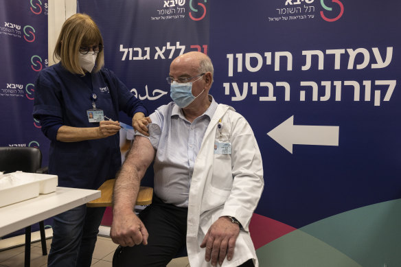 Professor Jacov Lavee receives a fourth dose of the Pfizer COVID-19 vaccine at Sheba Medical Centre. 
