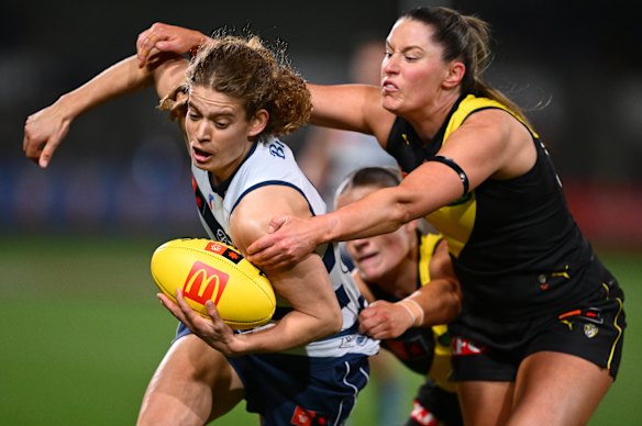 Nina Morrison of the Cats is tackled against Richmond on Friday night.