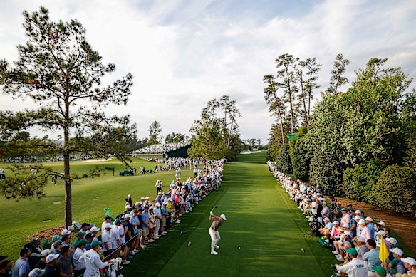 Rory McIlroy of Northern Ireland plays his shot from the 18th tee. He made par on the final hole. 