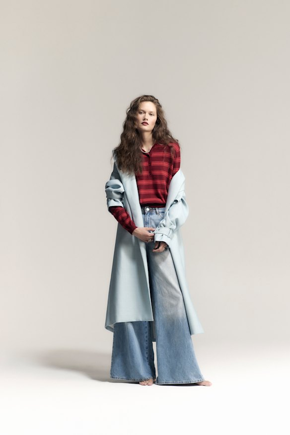 Camilla and Marc “Gehry” trench coat, $1100. Oroton “Flora” knit polo, $179. Zara jeans, $99