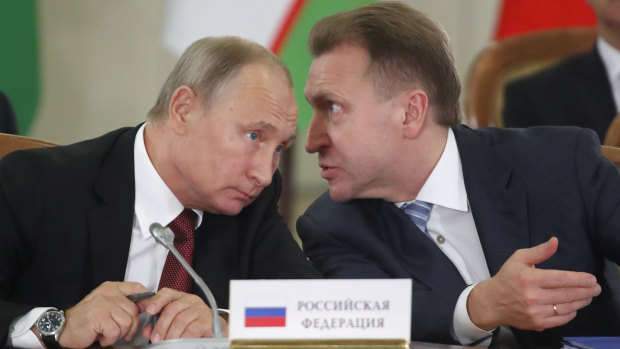 Vladimir Putin, left, and Russian First Deputy PM Igor Shuvalov.