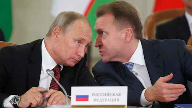 Vladimir Putin, left, and Russian First Deputy PM Igor Shuvalov.