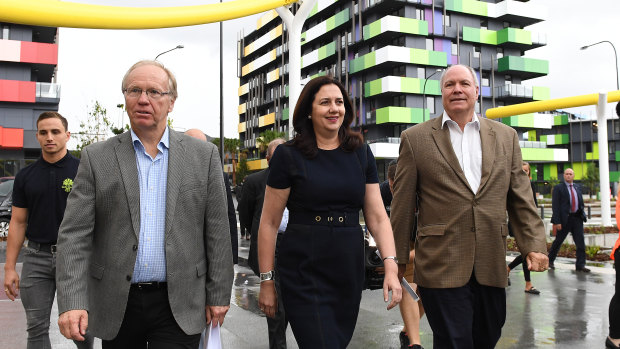 Commonwealth Games chairman Peter Beattie, Premier Annastacia Palaszczuk and Games chief executive Mark Peters inspect progress at the Games Village at Southport.