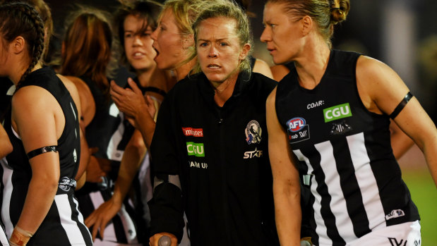 Kate Sheahan (centre) injured her knee early in her first game with Collingwood.