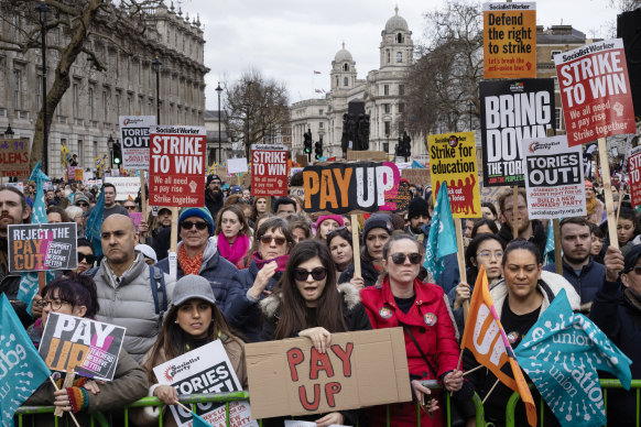 Education workers rally for higher pay in London.