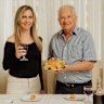 Jessica Timpano and her nonno, Bart Nicoliello, enjoy home-made croquettes and wine.