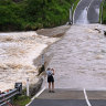 Cyclone threat may loom for flooded region, as PM and premier fly in