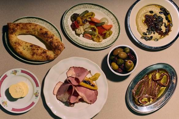 Rainbow olives, house pickles and anchovies. 