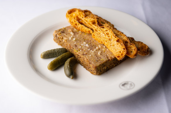 Pork rillette with pistachio and cornichons.