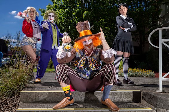 Halloween entertainers Jessica Robinson as Harley Quinn; Aaron Smith as The Joker; Timmy Hickey as The Mad Hatter; and Margaret Caddy as Wednesday Addams.
