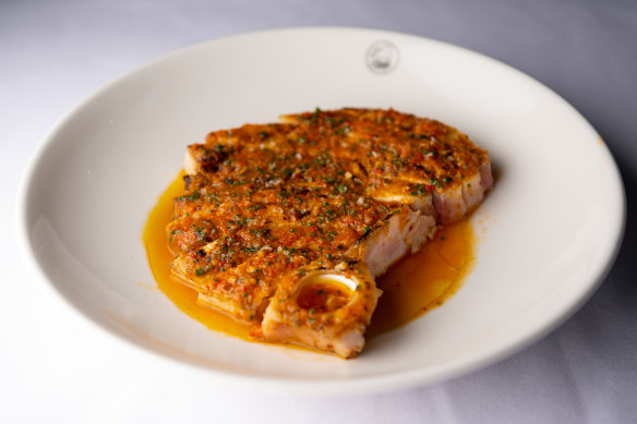 Go-to dish: Swordfish “rib-eye” is grilled on the bone and sent out awash with a gently piccante tomato oil.