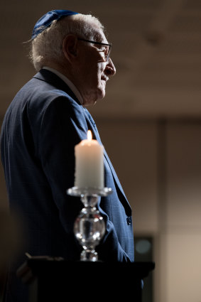 Eddie Jaku with the lit candle at the 75th anniversary of liberation of Auschwitz in Sydney