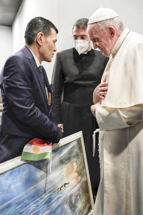 Pope Francis speaks to Abdullah Kurdi, left, father of Alan Kurdi, a the-year-old Syrian boy who drowned at the height of the 2018 migrant crisis. 