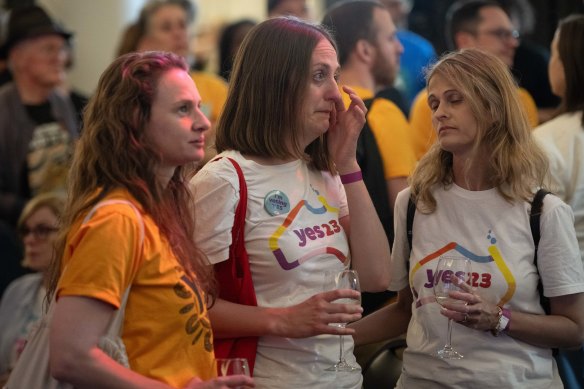 Broken-hearted Yes campaigners react to the result on Saturday night in Sydney. 