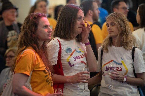 Broken-hearted Yes campaigners react to the result on Saturday night in Sydney. 
