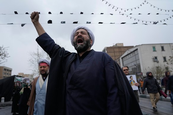 An Iranian cleric chants slogans during the annual anti-Israeli Quds Day, or Jerusalem Day rally in support of Palestinians.