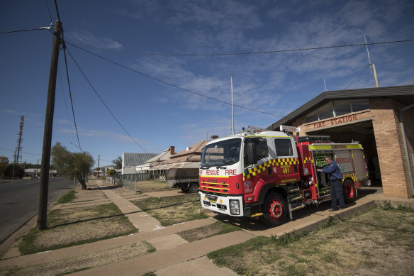 Rod Barclay tends to a NSW Fire & Rescue tanker at Warren's fire station.