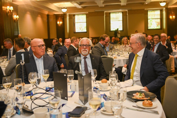 Neil Mitchell flanked by the prime minister and opposition leader at his testimonial lunch