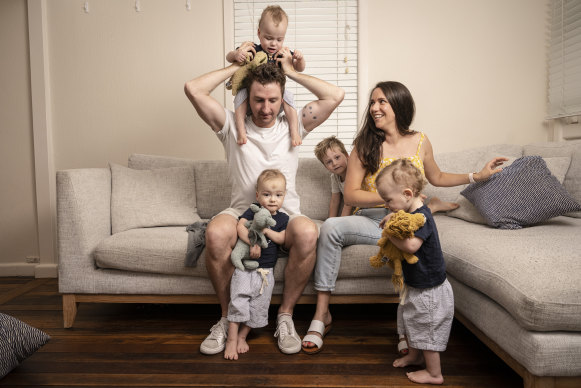 Jack and Kate Cowled with their triplets and eldest son. “A lot of people say to us, ‘Are you going to try for a girl?’ I think we’re done.”