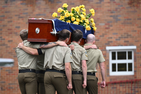 Pallbearers carry the casket of Lance Corporal Jack Fitzgibbon into St Joseph’s Catholic Church, in Cessnock, NSW.