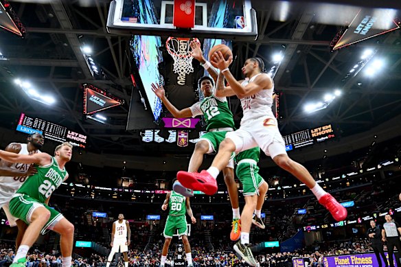 Tyrese Proctor drives the baseline against Boston during preseason.
