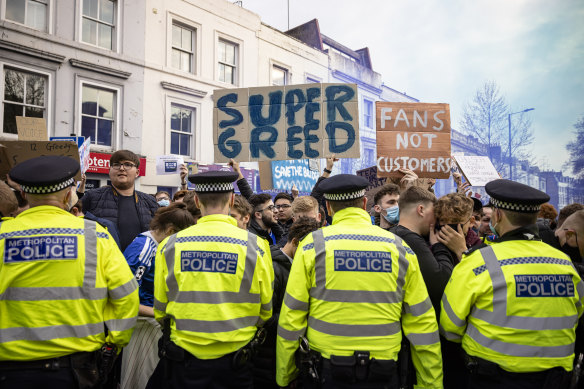 Fans of Chelsea Football Club protest the Super League in London.