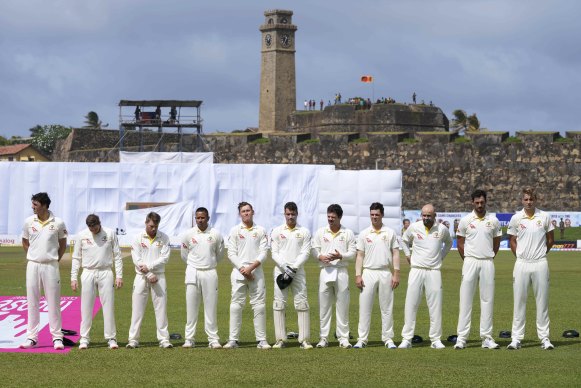 Australia’s cricketers stand in silent tribute to Shane Warne before the Test against Sri Lanka in Galle last week.