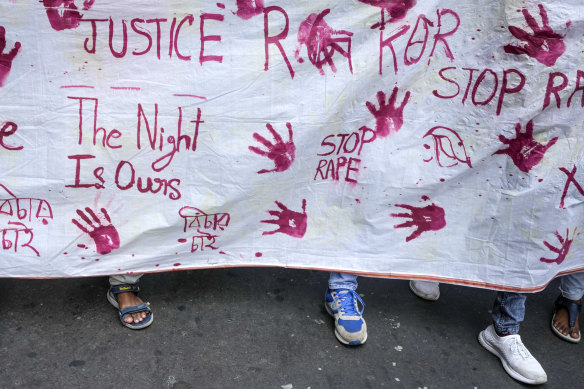 Engineers and engineering students attend a protest against the rape and killing of a trainee doctor at a government hospital, in Kolkata.