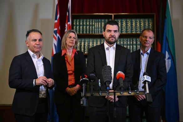 Evan Mulholland (second from right) speaks on Friday, alongside the Liberal leadership team of John Pesutto (left), Georgie Crozier and David Southwick.