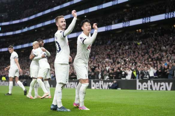 Maddison and Son-Hueng-min perform their darts celebration.