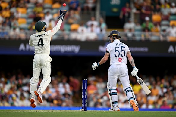 Carey, keeping up to the stumps, catches Ben Stokes off the bowling of Michael Neser in the pivotal moment of the final day of the Gabba Test.