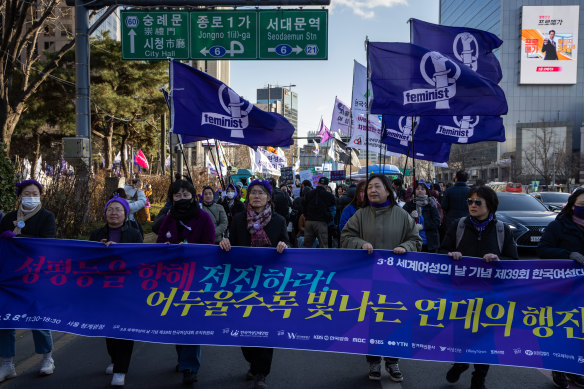Women march in Seoul for International Women’s Day 2024.