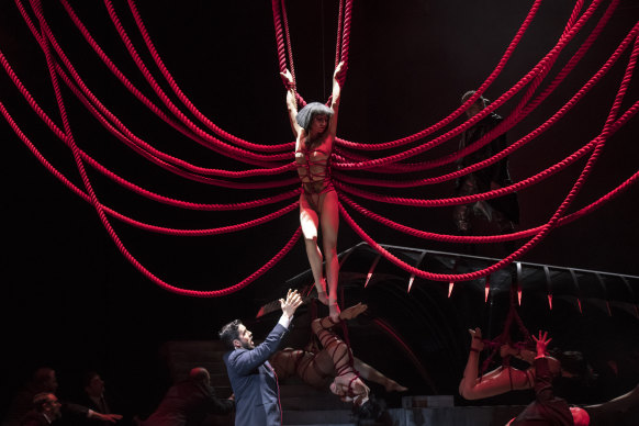The red jute shibari ropes are a prominent part of the production design.