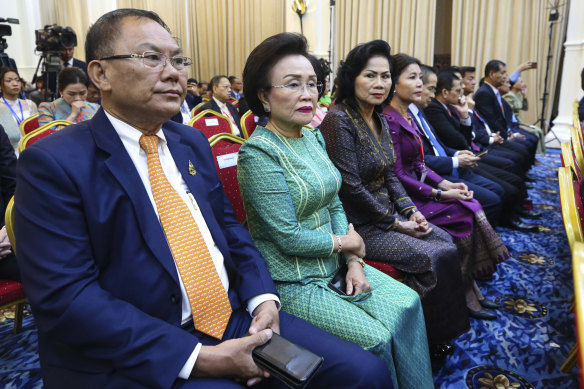 Cambodian businessman Ly Yong Phat, the president of the LYP Group, left attends a ceremony for the return of artefacts at Peace Palace in Phnom Penh, Cambodia.