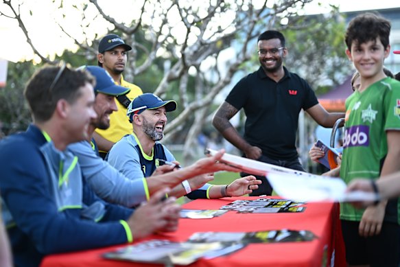Spinner Nathan Lyon shares a laugh with cricket fans in Darwin ahead of the Test match starting Thursday.