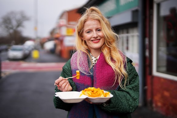 New Green Party MP Hannah Spencer stops to order lunch at Sue’s takeaway in Manchester.