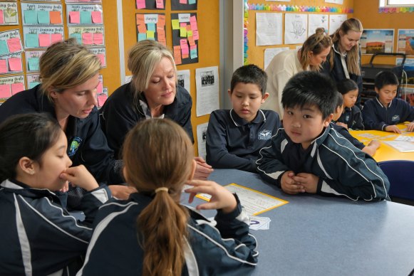 Teachers Lisa De Freitas and Karen Woods with year 3 students from St Raphael’s Catholic Primary School in South Hurstville.