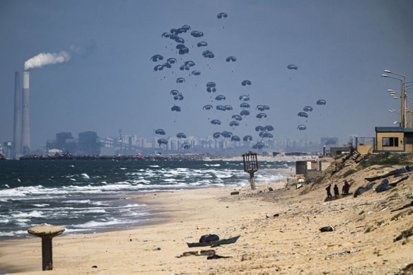 Too little, too late? An airdrop of humanitarian aid over the northern Gaza Strip.