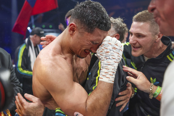 Jai Opetaia breaks down in tears after winning the world title.