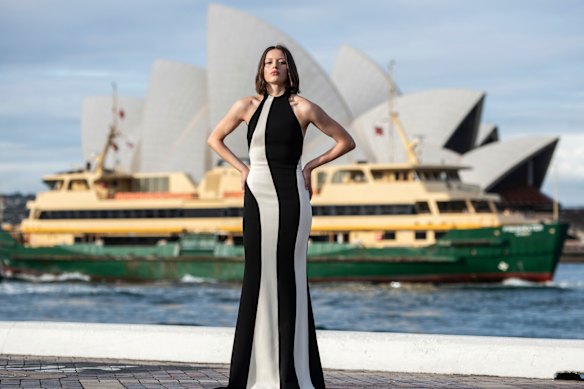 A model in Carla Zampatti before the opening show of Australian Fashion Week 2025 outside the Museum of Contemporary Art.