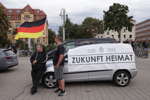 Supporters of the far-right “Zukunft Heimat” (“Homeland Future”) movement gather for an event on German Unity Day in Cottbus, Germany.