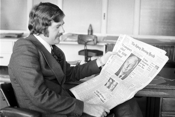 A man reads the Sydney Morning Herald on September 21, 1972. 