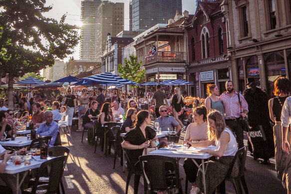 Crowds throng Adelaide’s streets during the Fringe Festival.