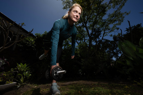 Sara Stace demonstrates the exercise she does to strengthen her hip muscles in Sydney.