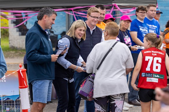 Former opposition leader Brad Battin, Opposition Leader Jess Wilson and Liberal candidate Anthony Marsh campaigning on Saturday.