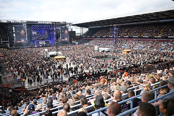 crowds wait in anticipation of Black Sabbath's final concert.