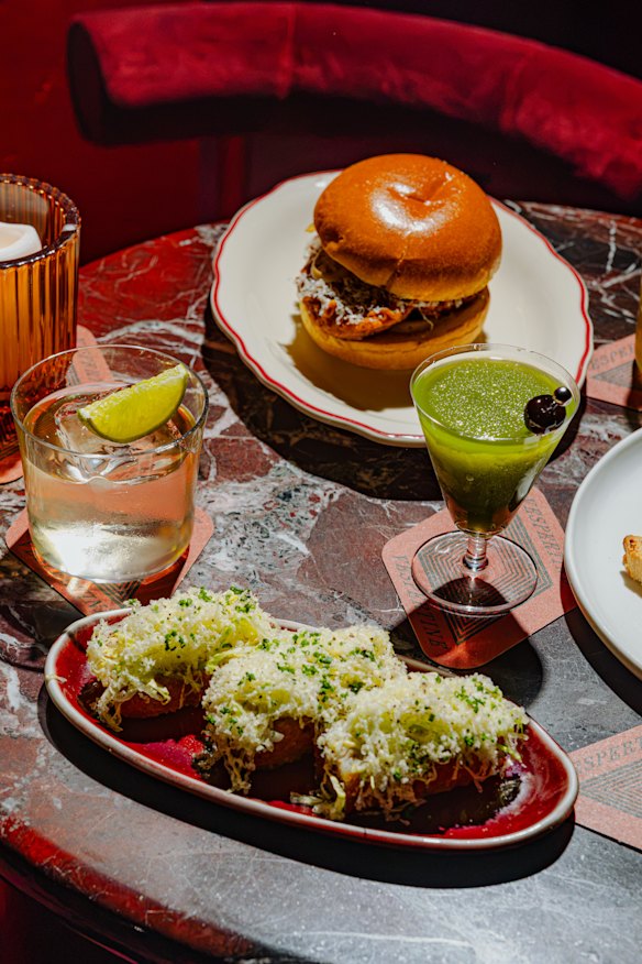 The key lime margarita (left) and Chartreuse slushie are instant signature drinks at Vespertine.