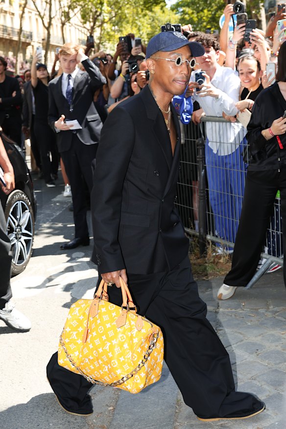 Pharrell Williams with Louis Vuitton’s new “Millionaire Speedy” bag that costs … $US1 million.